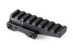 Black Unity tactical rail mount with screws on a white background