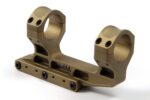 Tan-colored scope mount with dual rings for attaching optics to firearms