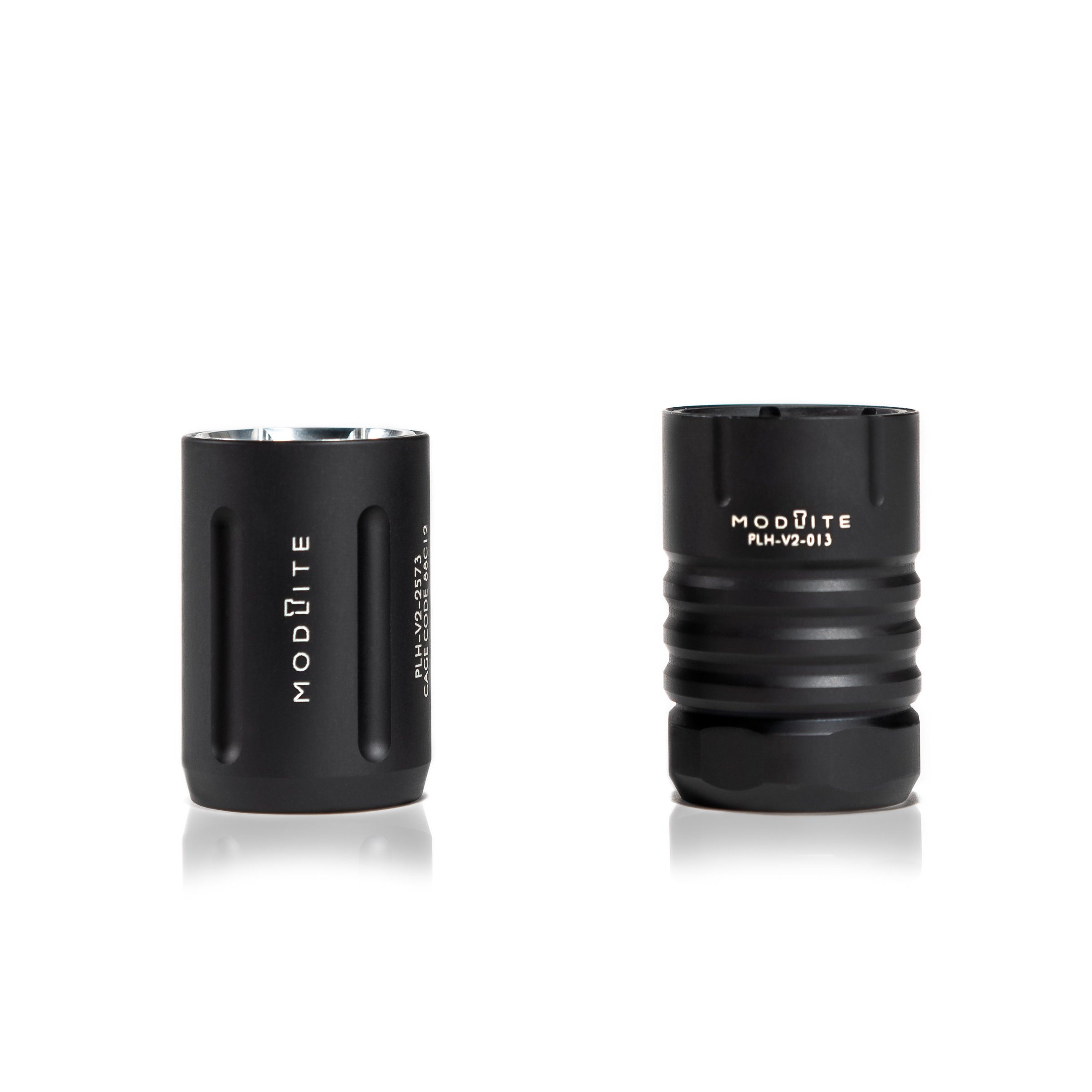 Two black Modlite flashlight heads standing upright on a white background.