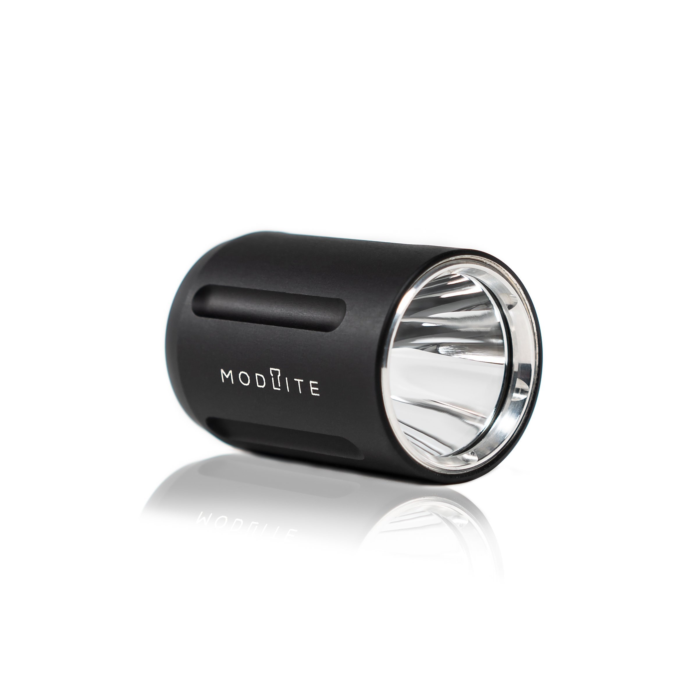 Black Modlite flashlight head on white background.