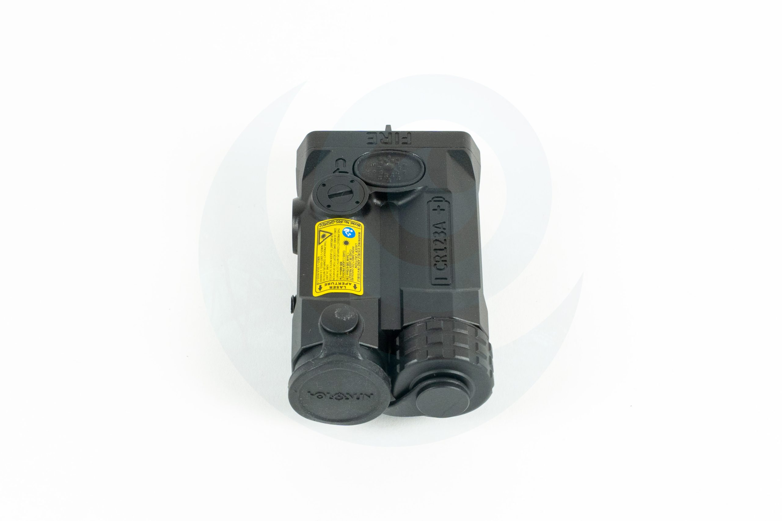 Night vision device with visible control knobs and yellow warning label top view.