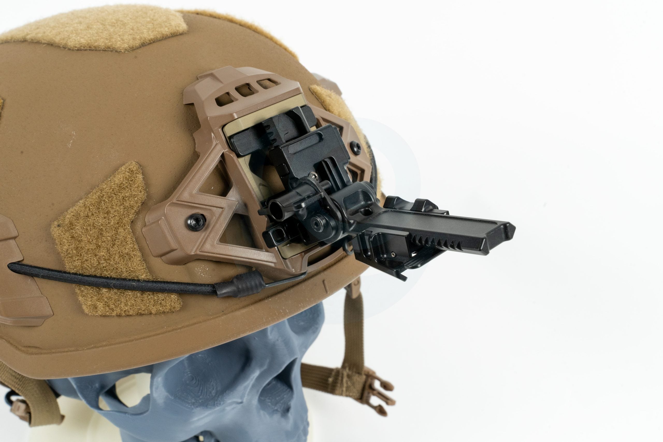 Tactical helmet with night vision mount attached shown on a mannequin head.