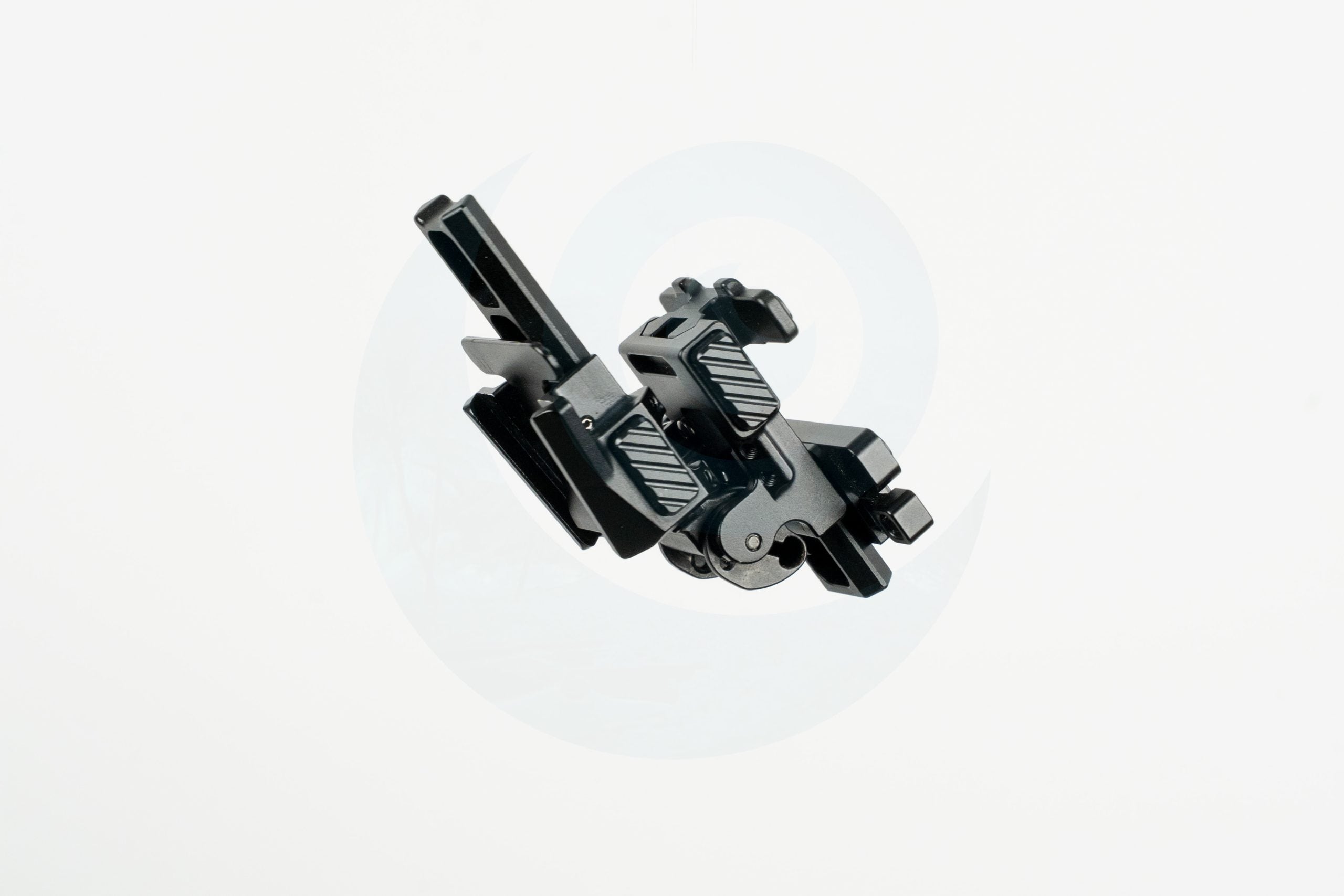 Black night vision mount adapter against a white background.