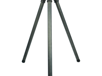 Carbon fiber tripod with green metal joints standing upright on a colorful background.