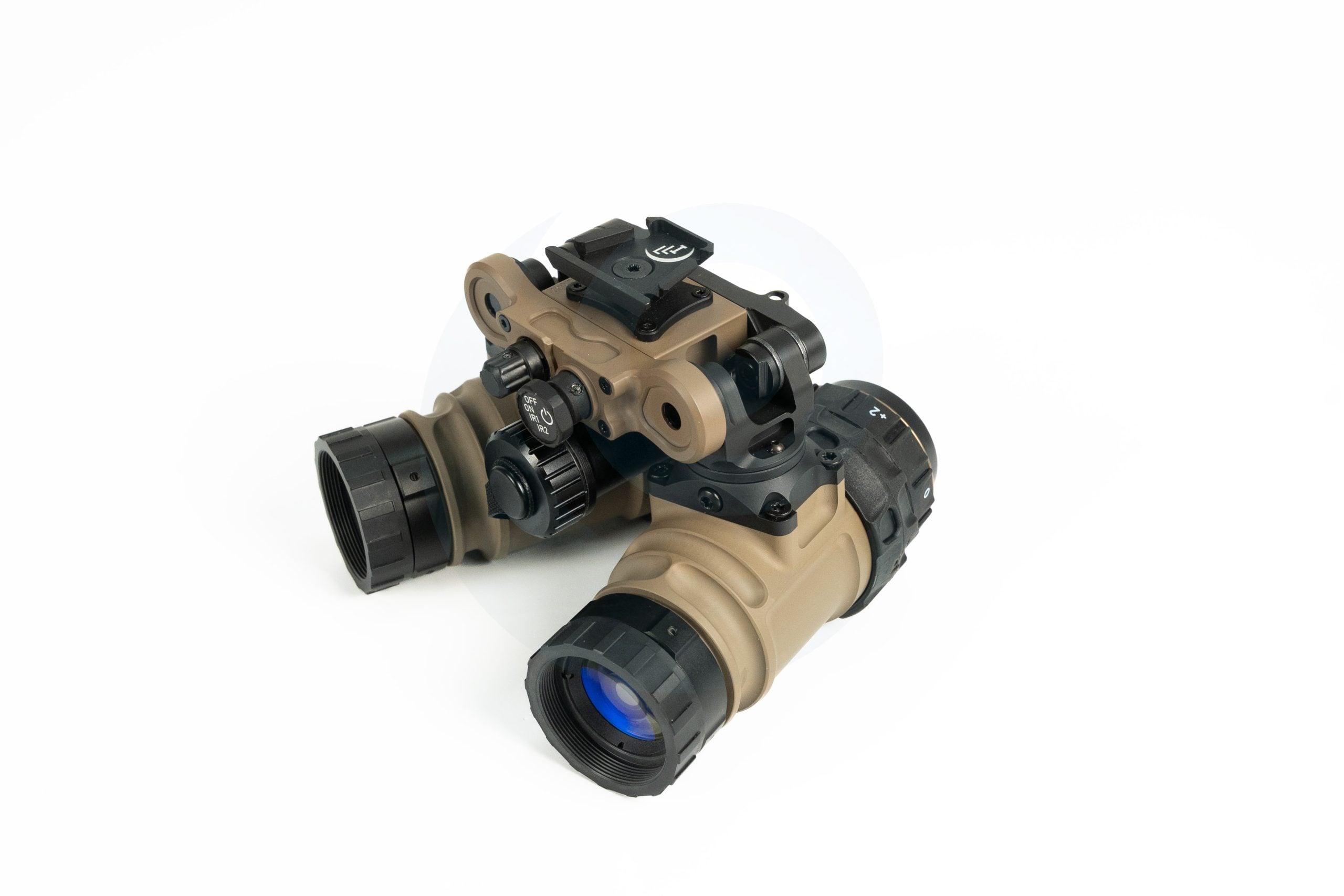 Dual-tube night vision goggles with tan housing on a white background.