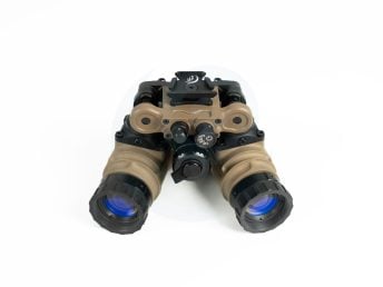 Dual-tube night vision goggles with tan housing on a white background.