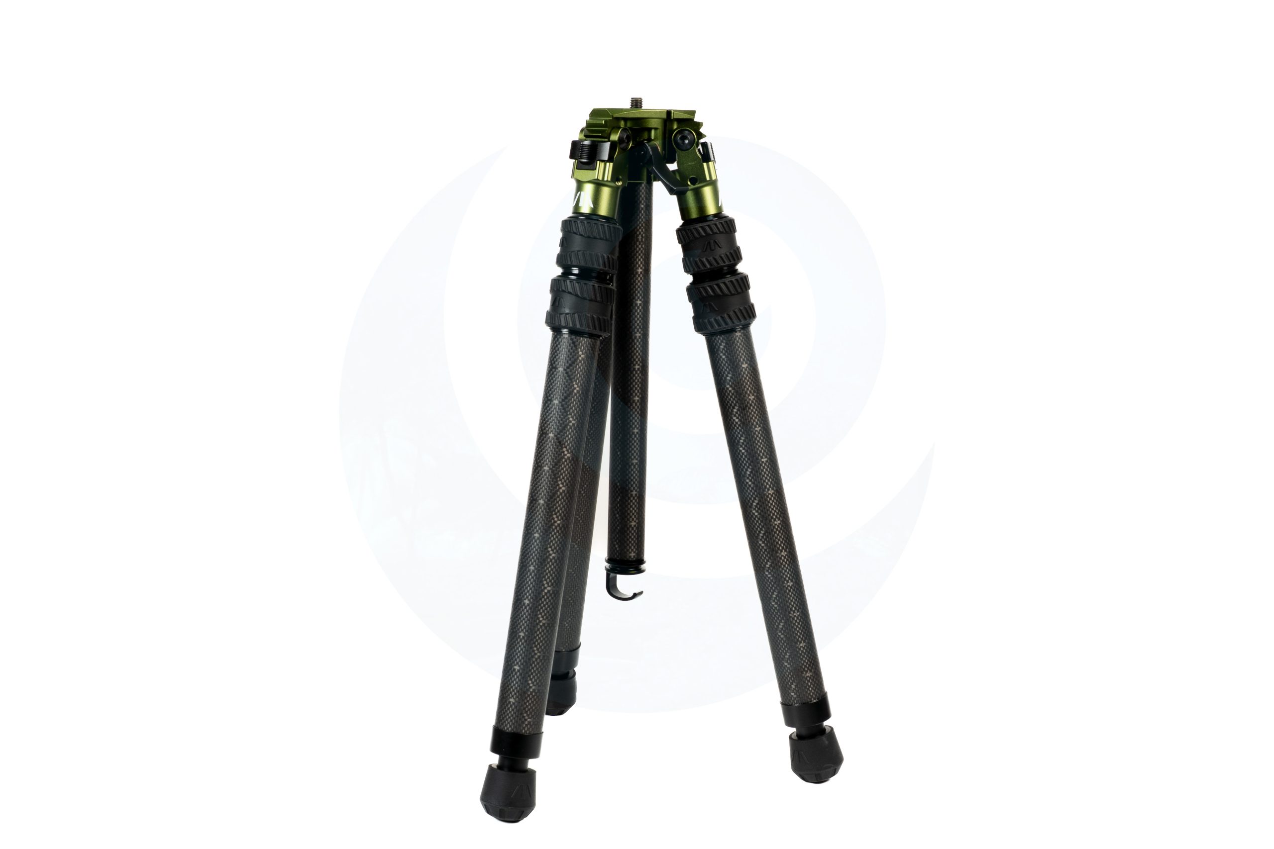 Carbon fiber tripod with green metal joints on a white background.