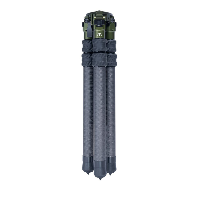 Folded carbon fiber tripod with green mounting head shown on a white background.