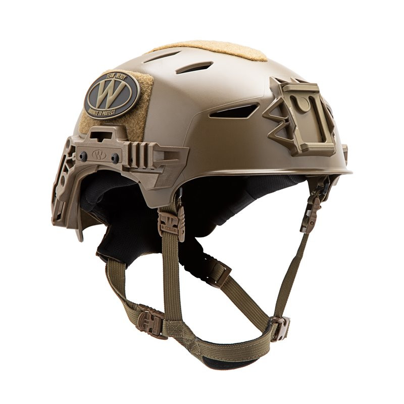 Coyote brown tactical helmet with side rails and chin strap viewed from an angle.